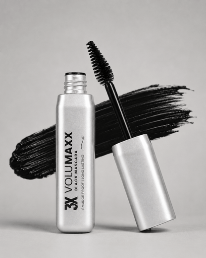 3X Volumaxx mascara bottle with black wand on a gray background volumizing mascara