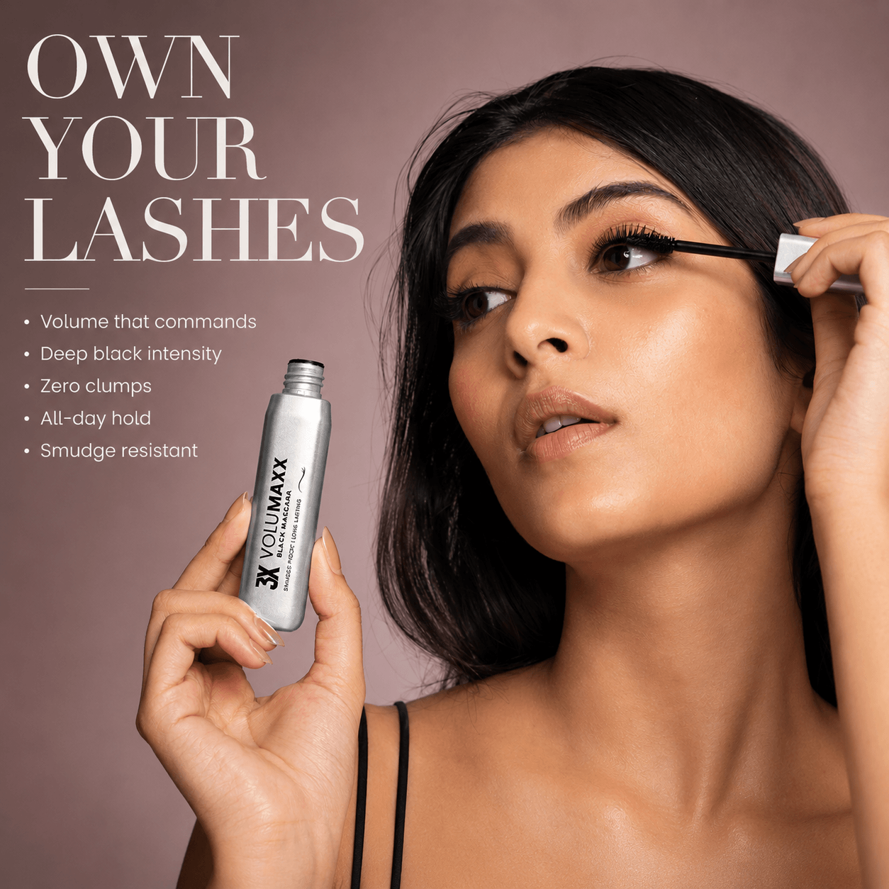 Woman applying volumizing mascara with a volumizing eyelash product on a brown background