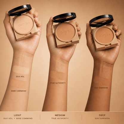 Three hands holding Imperia matte compact powders with color options labeled on a beige background.