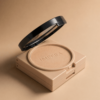 matte compact powder with a mirror on a beige background, featuring the brand 'Impera'.