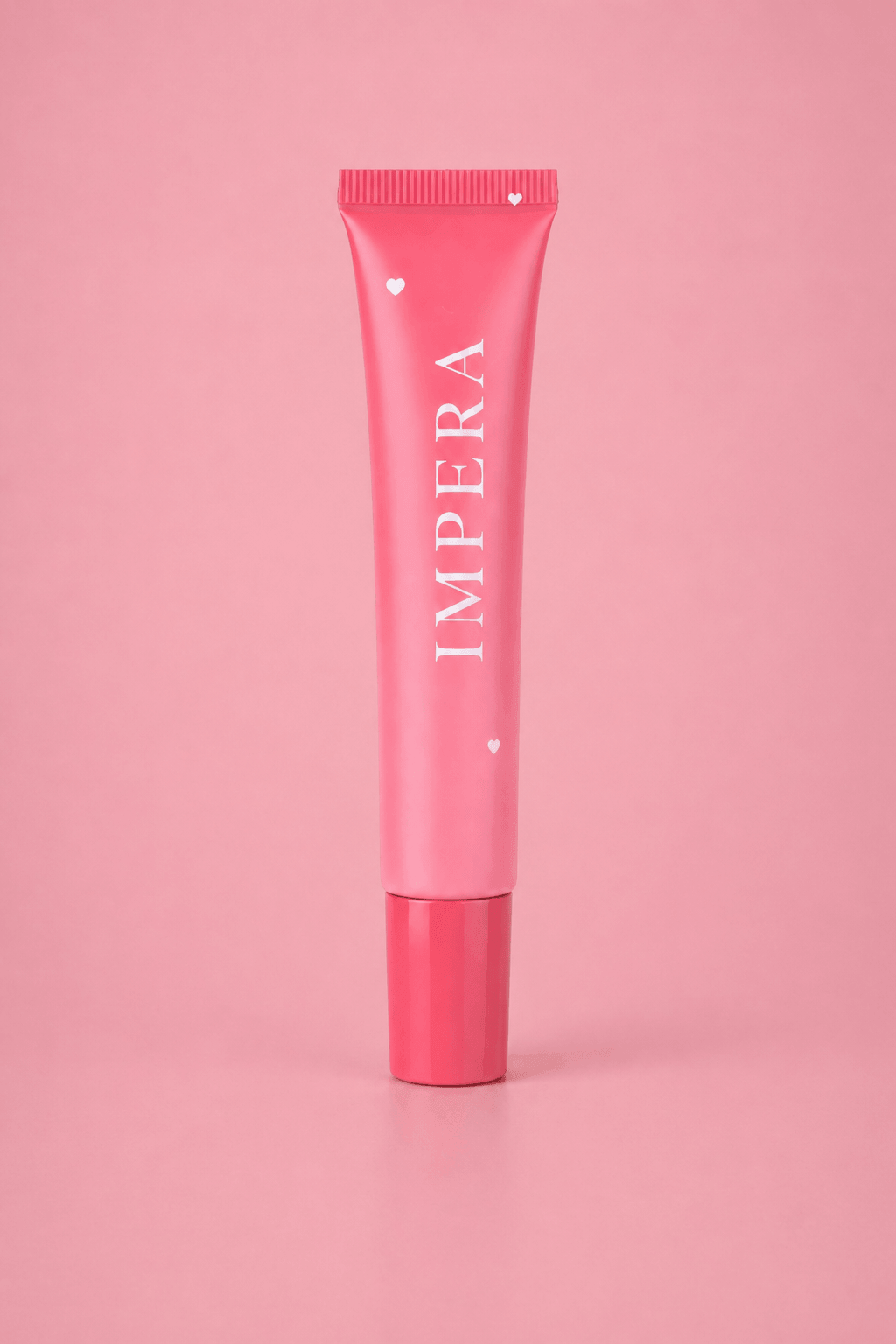 LIQUID BLUSH tube of IMPERA on a pink background